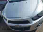 2013 Chevrolet Sonic LTZ with VIN 1G1JE5SH1D4166802, listed as a IAAI auction lot 41634168 with 86,351 mi miles and . Bid and sale history available at DreamBid. Image 12.