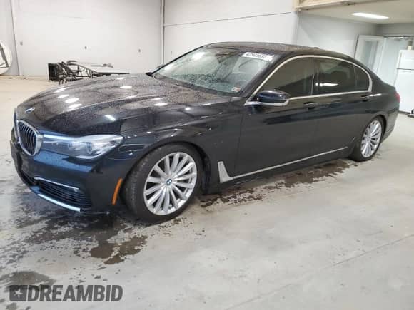 2017 BMW 7 Series 740i xDrive with VIN WBA7E4C53HGU99097, listed as a Copart auction lot 43945695 with 117,790 mi miles and Salvage title. Bid and sale history available at DreamBid. Image 1.