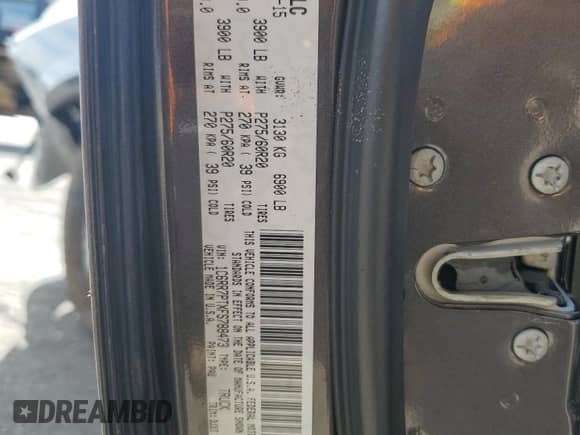 2015 Ram 1500 Laramie Longhorn z VIN 1C6RR7PTXFS788473, wystawiony jako Copart lot #51648395 z przebiegiem 92 715 mil mil oraz Szkoda całkowita • Salvage title. Historia ofert i sprzedaży dostępna na DreamBid. Obrazek 14.