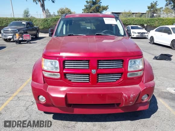 2010 Dodge Nitro with VIN 1D4PU5GX7AW112511, listed as a IAAI auction lot 43182461 with 175,803 mi miles and . Bid and sale history available at DreamBid. Image 12.