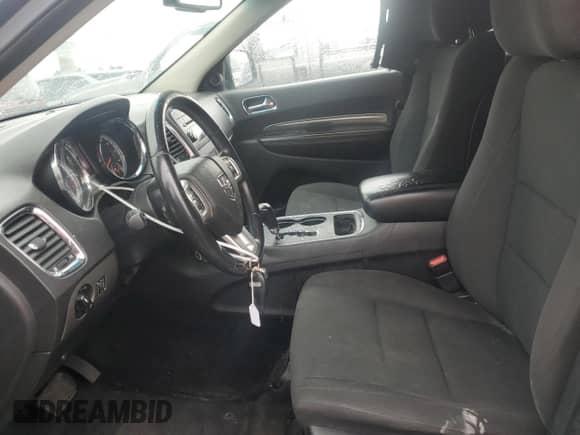 2013 Dodge Durango SXT with VIN 1C4RDJAG1DC662932, listed as a Copart auction lot 57784465 with 189,398 mi miles and Clean title. Bid and sale history available at DreamBid. Image 7.