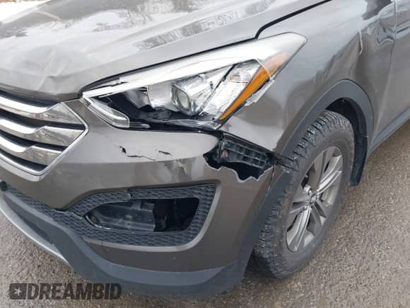 2013 Hyundai Santa Fe Sport with VIN 5XYZUDLB3DG120231, listed as a IAAI auction lot 41313690 with 188,907 mi miles and . Bid and sale history available at DreamBid. Image 6.
