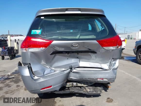 2013 Toyota Sienna L with VIN 5TDZK3DC4DS308136, listed as a IAAI auction lot 43009117 with 156,924 mi miles and . Bid and sale history available at DreamBid. Image 6.