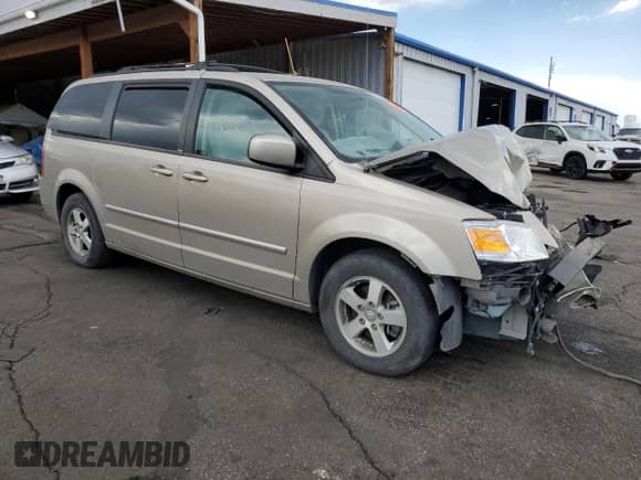 2009 Dodge Grand Caravan SXT с VIN 2D8HN54X79R659528, выставлен на аукционе Copart как лот 63452525 с пробегом Не указан миль и На запчасти • Non repairable. История ставок и продаж доступна на DreamBid. Изображение 4.