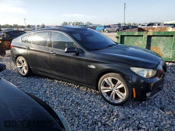 2010 BMW 5 Series 550i Gran Turismo с VIN WBASN4C55AC208428, выставлен на аукционе Copart как лот 67973385 с пробегом 135 394 миль миль и Списание • Salvage title. История ставок и продаж доступна на DreamBid. Изображение 4.