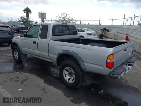 2004 Toyota Tacoma PreRunner z VIN 5TESM92N54Z442465, wystawiony jako IAAI lot #41448194 z przebiegiem 135 295 mil mil oraz . Historia ofert i sprzedaży dostępna na DreamBid. Obrazek 3.