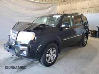 2010 Honda Pilot Touring with VIN 5FNYF4H91AB033815, listed as a Copart auction lot 65589255 with 197,143 mi miles and Salvage title. Bid and sale history available at DreamBid. Image 1.