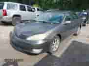 2006 Toyota Camry STD with VIN 4T1BE30K96U699347, listed as a IAAI auction lot 42737869 with 291,128 mi miles and . Bid and sale history available at DreamBid. Image 2.