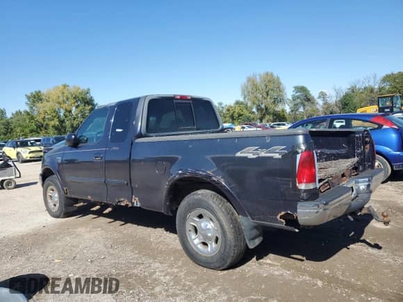 2000 Ford F-150 XL with VIN 2FTRX18L3YCA72984, listed as a Copart auction lot 85582165 with Not provided miles and Clean title. Bid and sale history available at DreamBid. Image 2.