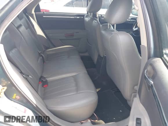 2005 Chrysler 300 C with VIN 2C3AA63H55H658765, listed as a IAAI auction lot 43453775 with 176,285 mi miles and . Bid and sale history available at DreamBid. Image 8.