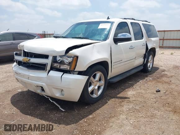 2013 Chevrolet Suburban LTZ with VIN 1GNSCKE02DR116233, listed as a IAAI auction lot 42275247 with 265,847 mi miles and . Bid and sale history available at DreamBid. Image 2.