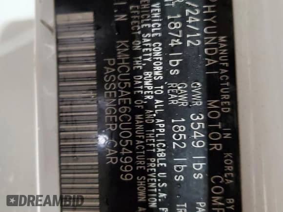 2012 Hyundai Accent SE z VIN KMHCU5AE6CU054999, wystawiony jako Copart lot #81822645 z przebiegiem 95 131 mil mil oraz Szkoda całkowita • Salvage title. Historia ofert i sprzedaży dostępna na DreamBid. Obrazek 12.