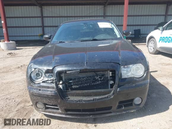 2006 Chrysler 300 C SRT-8 с VIN 2C3KA73W56H332748, выставлен на аукционе IAAI как лот 43292460 с пробегом 168 014 миль миль и . История ставок и продаж доступна на DreamBid. Изображение 12.