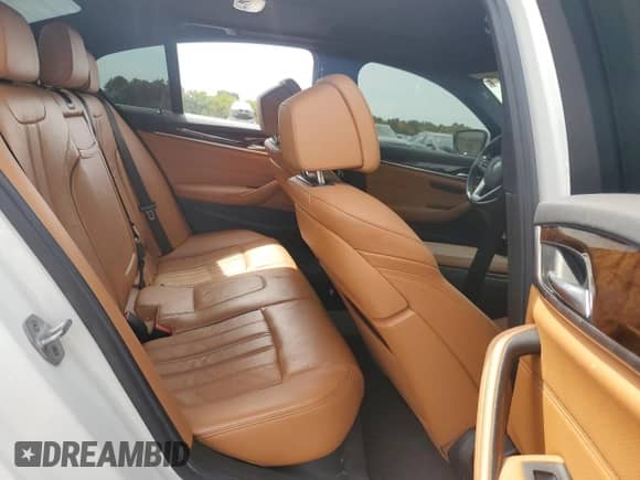 2018 BMW 5 Series 540i xDrive с VIN WBAJE7C59JG891885, выставлен на аукционе Copart как лот 71668125 с пробегом 104 821 миль миль и Списание • Salvage title. История ставок и продаж доступна на DreamBid. Изображение 10.