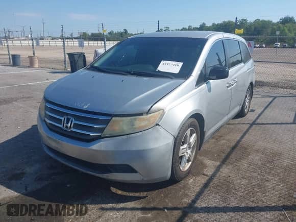 2012 Honda Odyssey EX с VIN 5FNRL5H43CB014791, выставлен на аукционе IAAI как лот 43327418 с пробегом 360 930 миль миль и . История ставок и продаж доступна на DreamBid. Изображение 17.
