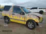 2003 Chevrolet Tracker with VIN 2CNBE18C136928311, listed as a Copart auction lot 84463154 with 118,195 mi miles and Salvage title. Bid and sale history available at DreamBid. Image 4.