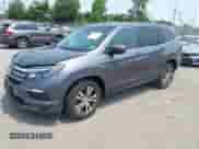 2017 Honda Pilot EX-L z VIN 5FNYF6H51HB005581, wystawiony jako IAAI lot #42360212 z przebiegiem 73 850 mil mil oraz . Historia ofert i sprzedaży dostępna na DreamBid. Obrazek 2.