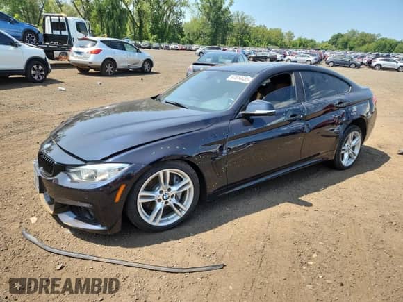 2017 BMW 4 Series 430i xDrive with VIN WBA4F9C55HG439979, listed as a Copart auction lot 67814485 with 97,398 mi miles and Salvage title. Bid and sale history available at DreamBid. Image 1.