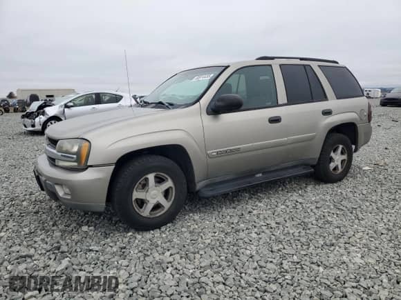 2003 Chevrolet TrailBlazer LT с VIN 1GNDT13S932200399, выставлен на аукционе Copart как лот 68914455 с пробегом 183 779 миль миль и Списание • Salvage title. История ставок и продаж доступна на DreamBid. Изображение 1.
