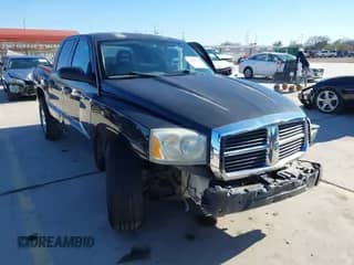 2005 Dodge Dakota SLT with VIN 1D7HE48N15S271078, listed as a IAAI auction lot 41666707 with 164,180 mi miles and . Bid and sale history available at DreamBid. Image 1.