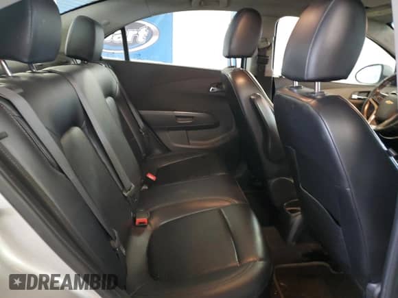 2013 Chevrolet Sonic LTZ z VIN 1G1JE5SH3D4123997, wystawiony jako Copart lot #45868825 z przebiegiem 120 913 mil mil oraz Szkoda całkowita • Salvage title. Historia ofert i sprzedaży dostępna na DreamBid. Obrazek 10.