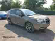 2017 Subaru Forester Touring with VIN JF2SJAWC2HH558055, listed as a Copart auction lot 65933405 with 111,950 mi miles and Salvage title. Bid and sale history available at DreamBid. Image 4.