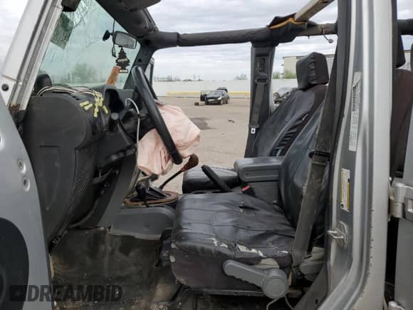 2008 Jeep Wrangler Unlimited Rubicon with VIN 1J8GA69188L586055, listed as a Copart auction lot 80672785 with 242,392 mi miles and Salvage title. Bid and sale history available at DreamBid. Image 7.