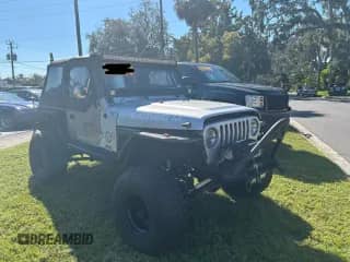 2005 Jeep Wrangler Rubicon with VIN 1J4FA69S35P303829, listed as a Copart auction lot 90132105 with 70,469 mi miles and Clean title. Bid and sale history available at DreamBid. Image 1.