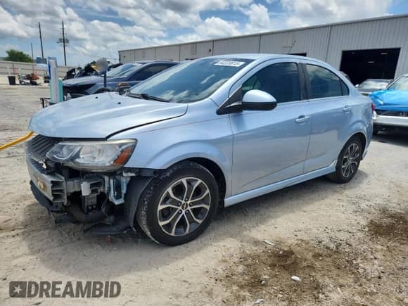2017 Chevrolet Sonic LT with VIN 1G1JD5SB9H4123359, listed as a Copart auction lot 64223815 with 136,587 mi miles and Salvage title. Bid and sale history available at DreamBid. Image 1.