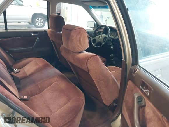 1990 Honda Accord with VIN JHMCB7552LC092914, listed as a IAAI auction lot 42347738 with 324,903 mi miles and . Bid and sale history available at DreamBid. Image 8.