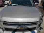 2009 Chevrolet Suburban 1LT z VIN 1GNFC26029R211530, wystawiony jako Copart lot #75316844 z przebiegiem Nie podano mil oraz Szkoda całkowita • Salvage title. Historia ofert i sprzedaży dostępna na DreamBid. Obrazek 13.