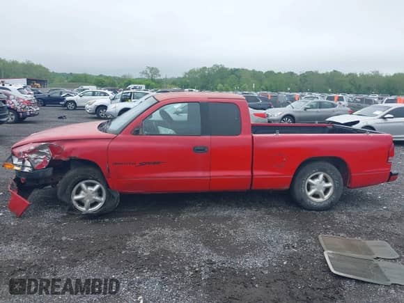 1998 Dodge Dakota SLT z VIN 1B7GL22X0WS741550, wystawiony jako IAAI lot #42176163 z przebiegiem 85 252 mil mil oraz . Historia ofert i sprzedaży dostępna na DreamBid. Obrazek 14.