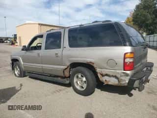 2001 Chevrolet Suburban LT z VIN 3GNFK16TX1G229401, wystawiony jako Copart lot #82693105 z przebiegiem Nie podano mil oraz Szkoda całkowita • Salvage title. Historia ofert i sprzedaży dostępna na DreamBid. Obrazek 2.