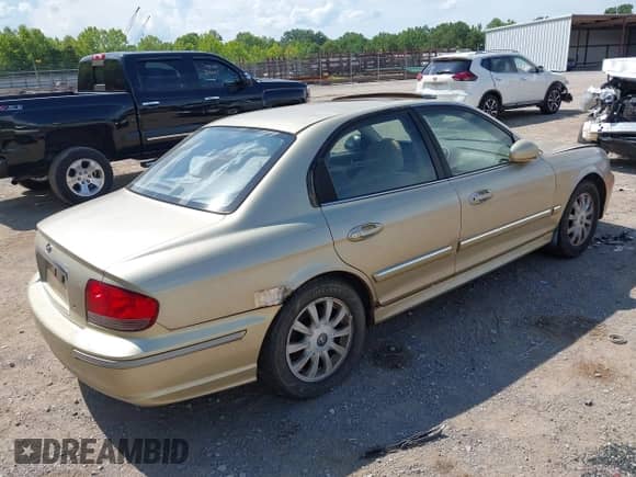 2002 Hyundai Sonata GLS z VIN KMHWF35H02A718973, wystawiony jako IAAI lot #42745812 z przebiegiem 82 932 mil mil oraz . Historia ofert i sprzedaży dostępna na DreamBid. Obrazek 4.