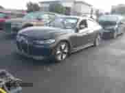 2023 BMW i4 eDrive35 with VIN WBY43AW02PFP50656, listed as a IAAI auction lot 41776504 with 18,024 mi miles and . Bid and sale history available at DreamBid. Image 2.