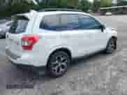 2016 Subaru Forester XT Touring z VIN JF2SJGXC4GH486064, wystawiony jako IAAI lot #42801023 z przebiegiem 134 785 mil mil oraz . Historia ofert i sprzedaży dostępna na DreamBid. Obrazek 4.