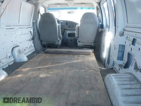 2003 Ford Econoline Cargo with VIN 1FTNE24L23HA98641, listed as a IAAI auction lot 41285948 with 257,510 mi miles and . Bid and sale history available at DreamBid. Image 8.