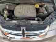 2014 Dodge Grand Caravan SXT with VIN 2C4RDGCG5ER477307, listed as a Copart auction lot 84047895 with 152,010 mi miles and Salvage title. Bid and sale history available at DreamBid. Image 12.