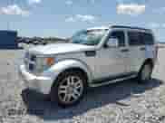2011 Dodge Nitro Heat with VIN 1D4PT4GK5BW605204, listed as a Copart auction lot 52677235 with 104,039 mi miles and Salvage title. Bid and sale history available at DreamBid. Image 1.