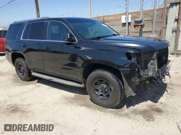 2015 Chevrolet Tahoe Commercial with VIN 1GNLC2EC9FR650069, listed as a Copart auction lot 67013555 with 245,856 mi miles and Salvage title. Bid and sale history available at DreamBid. Image 4.