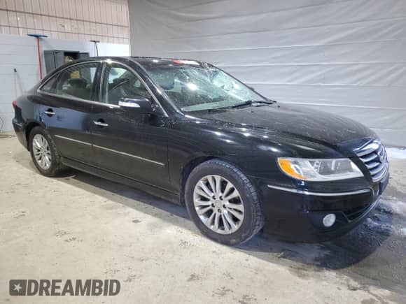 2011 Hyundai Azera Limited с VIN KMHFC4DF1BA544460, выставлен на аукционе Copart как лот 48556125 с пробегом 148 693 миль миль и Списание • Salvage title. История ставок и продаж доступна на DreamBid. Изображение 4.