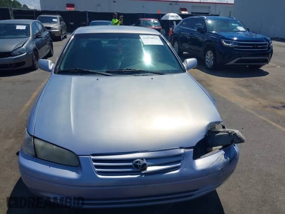 1997 Toyota Camry LE z VIN JT2BF22K2V0021868, wystawiony jako IAAI lot #43070012 z przebiegiem 128 808 mil mil oraz . Historia ofert i sprzedaży dostępna na DreamBid. Obrazek 12.