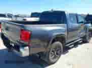 2021 Toyota Tacoma SR5 with VIN 5TFAZ5CN0MX106119, listed as a IAAI auction lot 42812735 with 70,968 mi miles and . Bid and sale history available at DreamBid. Image 4.