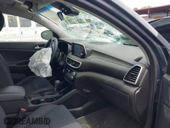 2019 Hyundai Tucson SE z VIN KM8J2CA49KU958921, wystawiony jako IAAI lot #42322518 z przebiegiem Nie podano mil oraz . Historia ofert i sprzedaży dostępna na DreamBid. Obrazek 5.