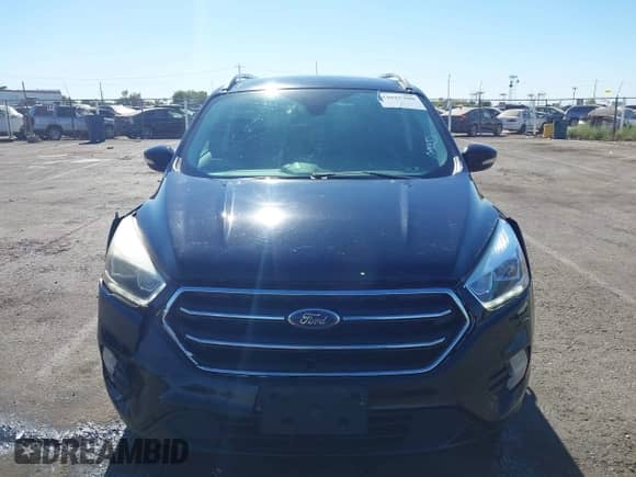 2017 Ford Escape Titanium with VIN 1FMCU0JD6HUE90933, listed as a IAAI auction lot 43035309 with 76,661 mi miles and . Bid and sale history available at DreamBid. Image 13.
