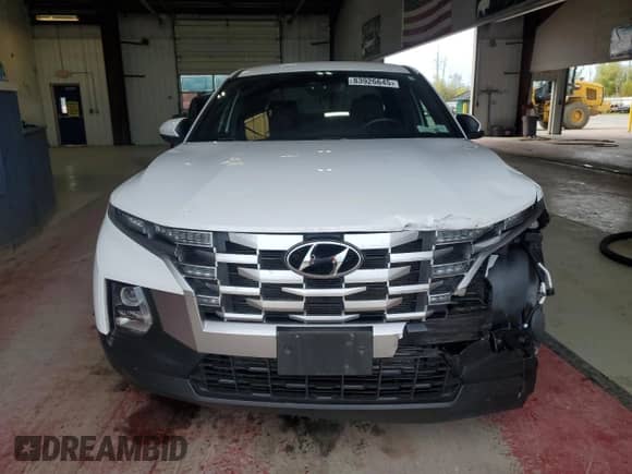 2022 Hyundai Santa Cruz SE с VIN 5NTJADAE1NH011278, выставлен на аукционе Copart как лот 83926645 с пробегом 70 266 миль миль и Списание • Salvage title. История ставок и продаж доступна на DreamBid. Изображение 5.