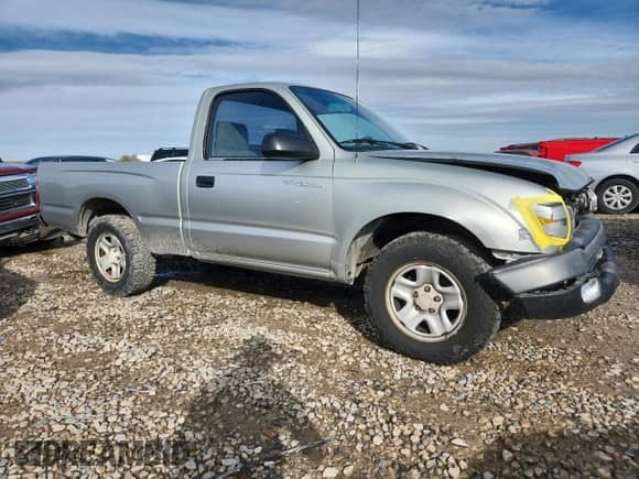 2001 Toyota Tacoma with VIN 5TENL42N51Z813395, listed as a Copart auction lot 82456405 with 144,970 mi miles and Salvage title. Bid and sale history available at DreamBid. Image 4.
