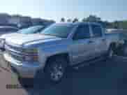 2014 Chevrolet Silverado 1500 LT with VIN 3GCPCREHXEG259073, listed as a IAAI auction lot 43010013 with 128,000 mi miles and . Bid and sale history available at DreamBid. Image 18.
