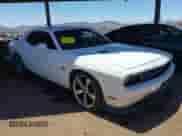 2013 Dodge Challenger SRT-8 with VIN 2C3CDYCJ1DH588064, listed as a IAAI auction lot 42283713 with 143,262 mi miles and . Bid and sale history available at DreamBid. Image 1.