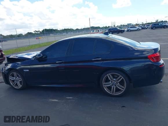 2014 BMW 5 Series 535i with VIN WBA5B1C51ED482603, listed as a IAAI auction lot 43446526 with 103,217 mi miles and . Bid and sale history available at DreamBid. Image 14.